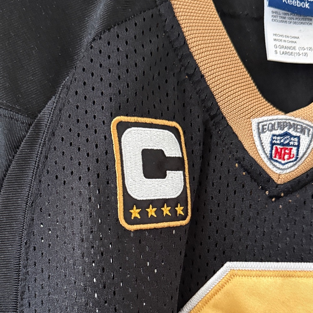 Reebok Black and Gold Sports Jersey - Picture 3 of 7